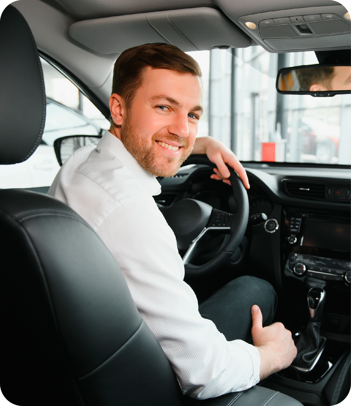 Taxi driver in his car